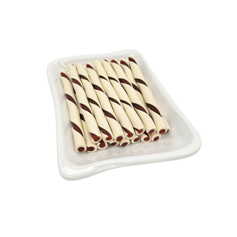 Multi-flavored, two-tone twisted dog treats/chew sticks for stress relief and teeth cleaning.